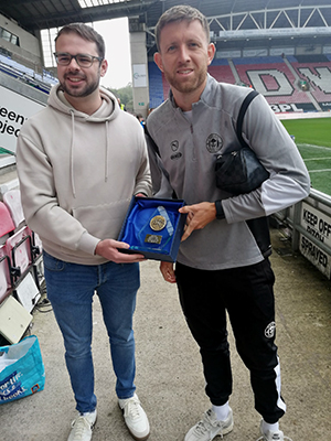 Will Aimson receiving his away player of the match award